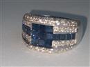 Witgouden ring ingelegd met diamanten en saffieren
